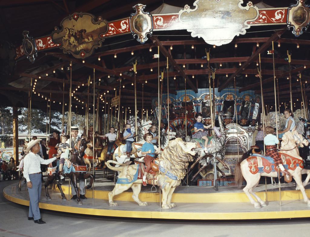 The 1902 Dentzel Merry-Go-Round shown here at Knott’s, ca. 1965, was the first ride that Hurlbut brought to Walter Knott. Bud had to convince Walter to let him bring it onto the property. The carousel originally ran at Hershey Park in PA, and then Brady Park in Ohio, before Bud installed it at Knott’s Berry Farm in the 1950s.