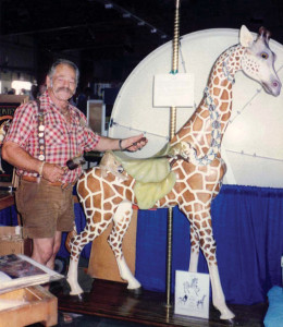W.P. and his giraffe at the Nevada State Fair, Reno, NV, in the fall of 1992. Painted by Marge Swenson. The figure is now in the private Collection of Lourinda Bray.