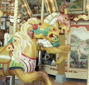 Ca. 1928 carousel horses aboard the carousel at the Van Andel Museum Center.