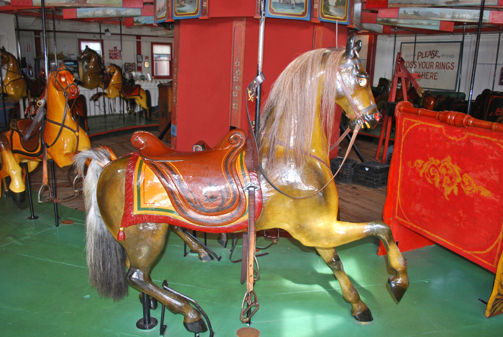A standing horse on the Oak Bluffs carousel. There are also prancers, as can be seen in the background. Photo courtesy of Roland Hopkins